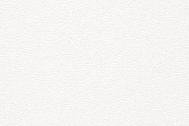 istock white wallpaper with empty space for text. paper texture of cardboard sheet 1393725241