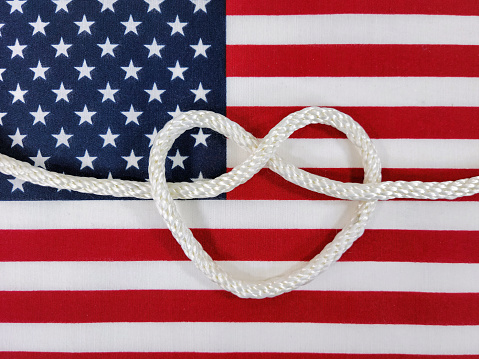 White rope heart on an American flag
