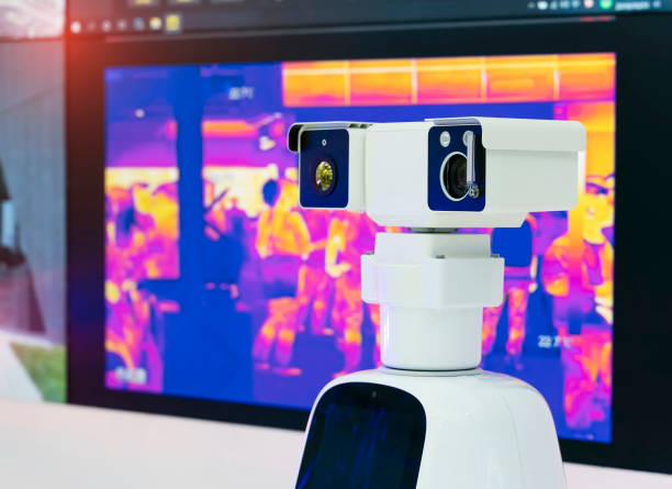 istock Robot of cctv security surveillance camera in a server room 1393726347
