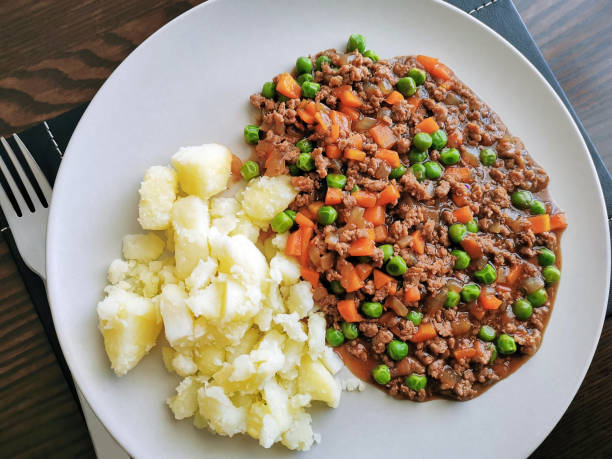 istock Minced and tatties with a fork on a plate. 1393726382