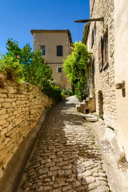 Old road in the village of Gordes in Luberon land in France