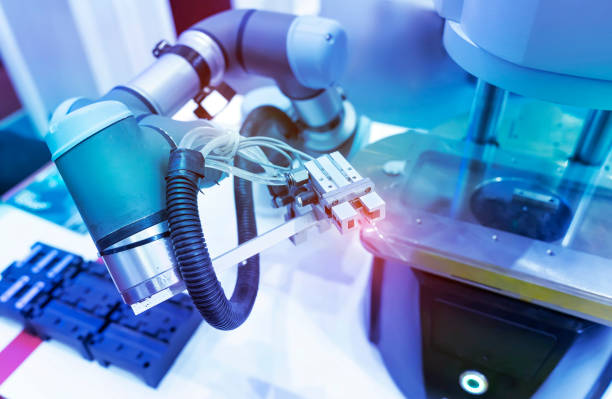 istock Automatic industrial robotic robot working, industry 4.0 and technology concept 1393728068