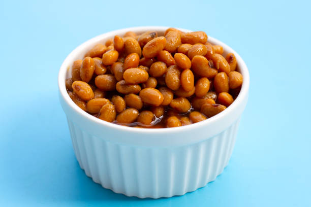 Baked beans in individual ceramic bowl