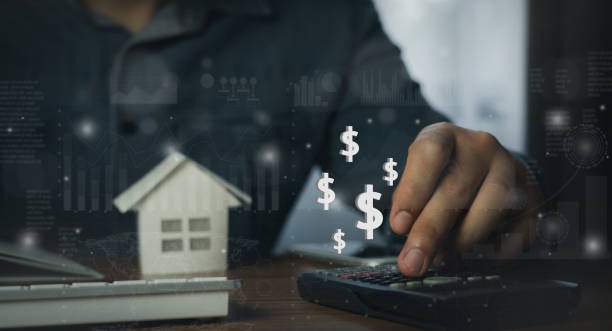 Agent businessman calculate money with house model. family health live. financial real estate property investment. Statistics growth up of graph. Management  strategy.home mortgage concept. banking. stock photo