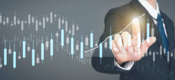 istock Businessman plan graph growth and increase of chart positive indicators 1393734394