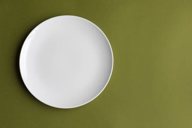 istock Directly above shot of clean empty plate on table 1393736468