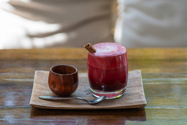 istock Glass of beetroot vanilla latte from fresh beetroot juice blended with vanilla and coconut milk 1393738071