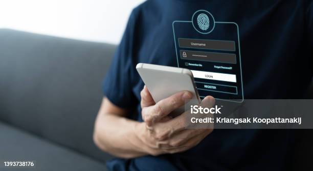 Man Using Smartphone For Online Banking Or Shopping And Payment Via Credit Card Mobile Phone Fingerprint Scan And Login For Security System Business Commercial And Personal Financial Idea Concept Stock Photo - Download Image Now
