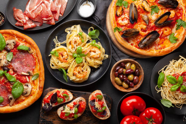 istock Italian cuisine. Pizza, pasta and toasts 1393739721