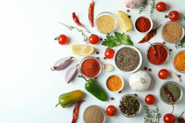 istock Concept of aromatic spices on white background 1393739855