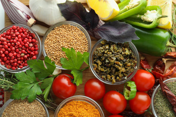 istock Bowls with different aromatic spices and ingredients, top view 1393740475
