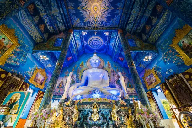 Chiang Rai, Thailand - January, 09, 2022 :  Very beautiful buddha statue in the chapel of Wat Rong Suea Ten at Chiangrai Thailand.