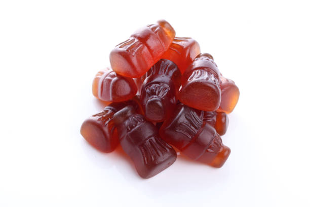 istock Cola Flavored Gummy on a White Background 1393742568