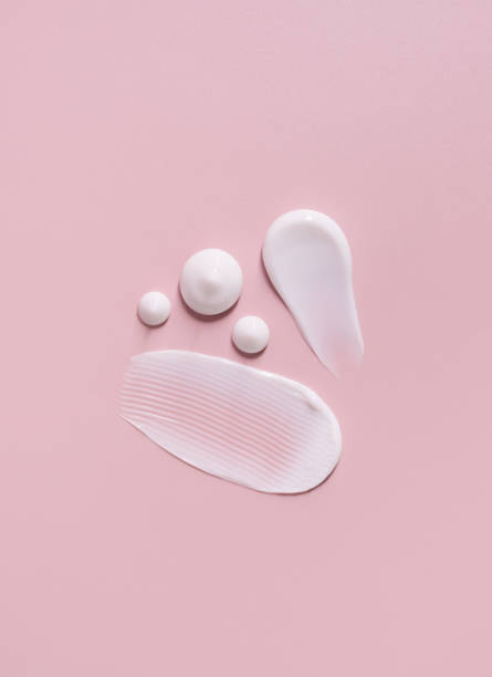 istock cosmetic smears cream texture on pastel pink background 1393749395