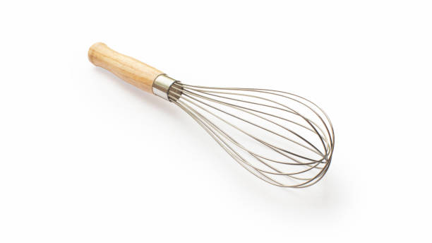 Whisk cooking egg beater mixer whisker with wooden handle stock photo