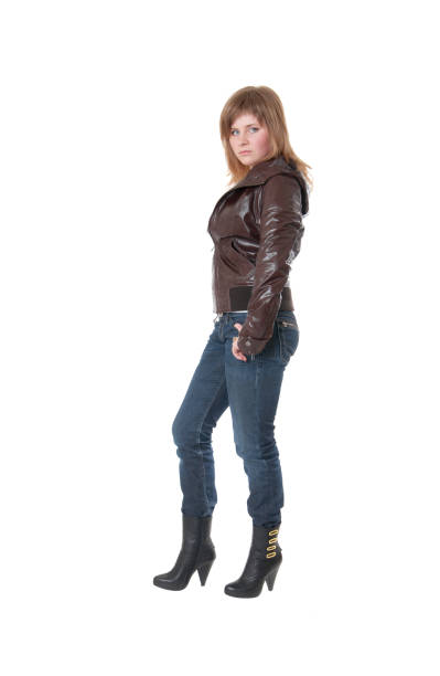 istock girl in leather jacket and jeans 1393750223