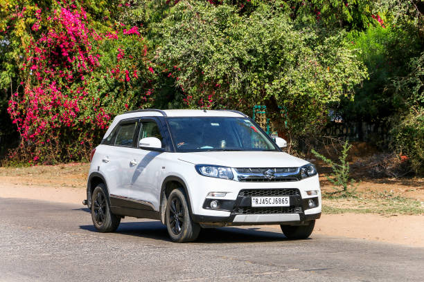 Maruti Suzuki Vitara Breeze Sawai Madhopur, India - March 1, 2022: Compact crossover car Maruti Suzuki Vitara Brezza in a city street. brezza stock pictures, royalty-free photos & images