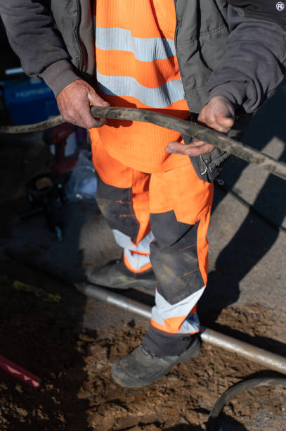 istock Workers laid connection for gas, gas cable for house connection 1393750888