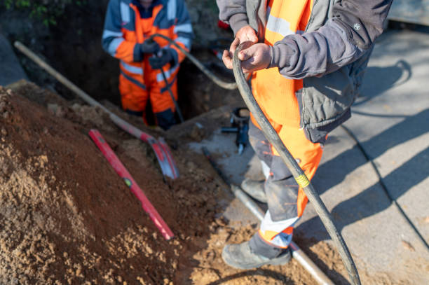 Workers laid connection for gas, gas cable for house connection stock photo
