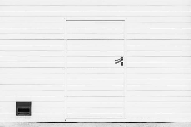 istock Metal white gate and door. 1393752238