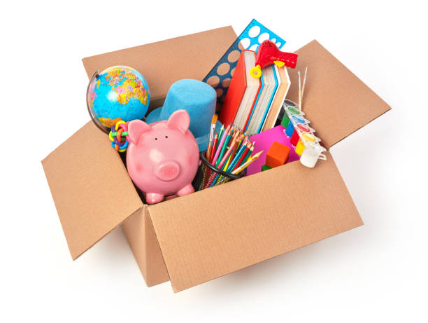 istock Cardboard box full with kid's toys 1393753704