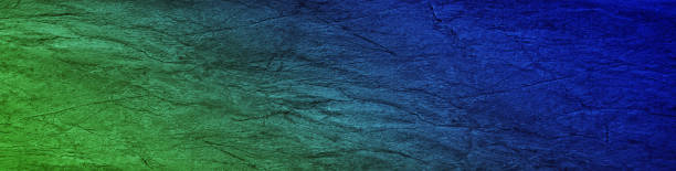 istock Beautiful dark blue green texture. Gradient. Toned cracked rough stone surface. Abstract colorful background with space for design. Web banner. Website header. 1393756153