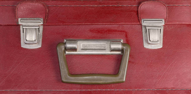 istock Part of old hard-shell suitcase with handle and push latches 1393756561