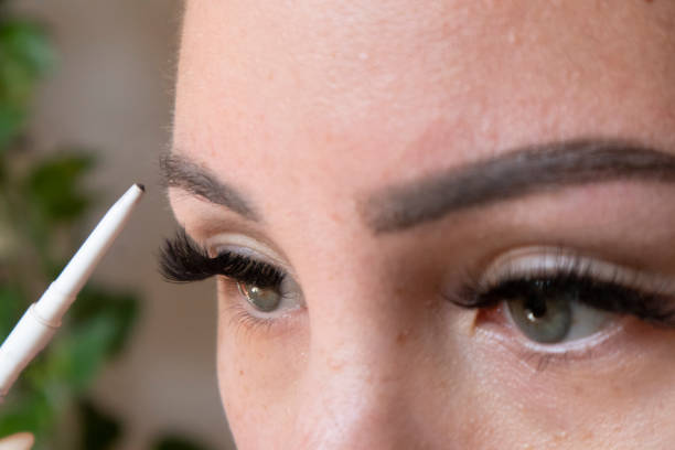 istock Woman applying tinted eyebrow gel 1393758660