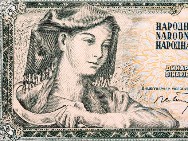 istock Woman with sickle from Yugoslav money 1393759928
