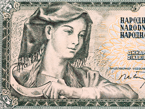 Woman with sickle from Yugoslav money - Dinar