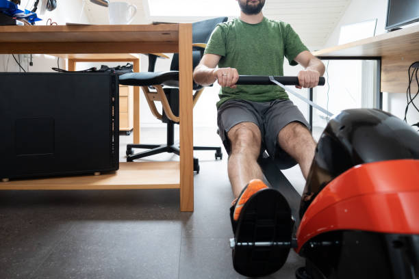 Sports at Home: Rowing Machine stock photo
