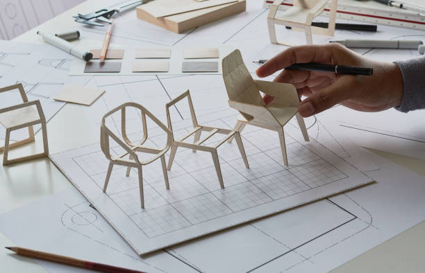 istock Designer sketching drawing design development product plan draft chair armchair Wingback Interior furniture prototype manufacturing production. designer studio concept . 1393762034