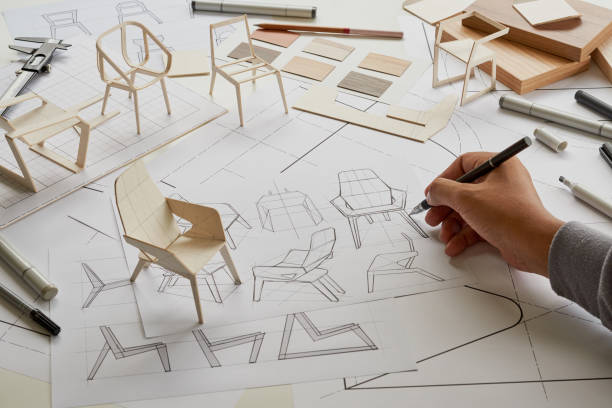istock Designer sketching drawing design development product plan draft chair armchair Wingback Interior furniture prototype manufacturing production. designer studio concept . 1393762035