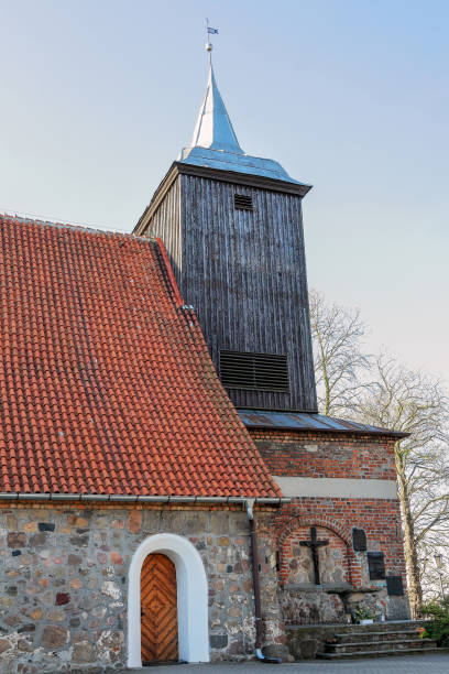 istock Old church with a wooden tower 1393765020