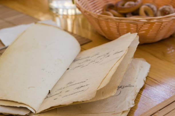 istock Open paper menu with blurred text stylized antique in cafe 1393765730