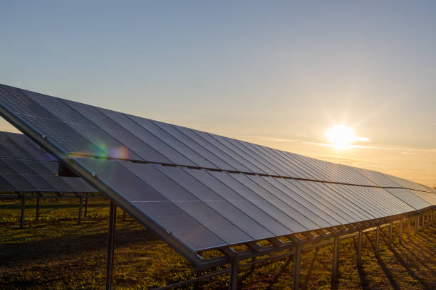 istock Solar panel with sunlight, sunset. Concept of clean energy, alternative source of electricity. 1393766074