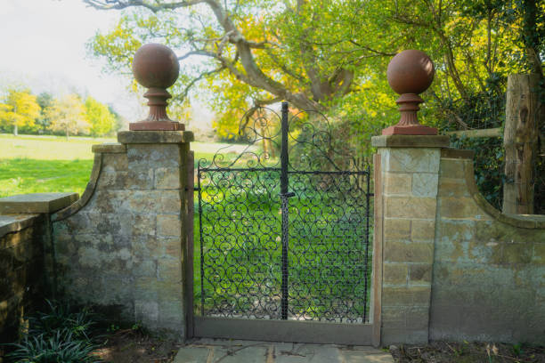 istock Locked gate and footpath in rural countryside 1393766134