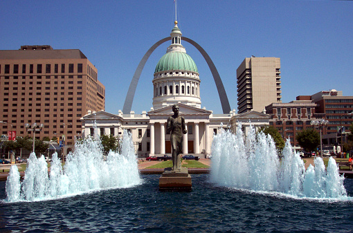 Logan Square and Philadelphia Skyline, Downtown. Pennsylvania, USA. Traffic circle center features a large fountain with whimsical statuary, garden areas with benches.
