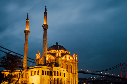 Night view at Ortakoy Mosque in Istanbul, Turkey on the Bosphorus Bridge.