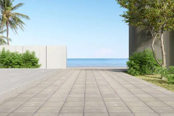 Photo of Empty concrete footpath with building wall landscape on sea background. 3d rendering.