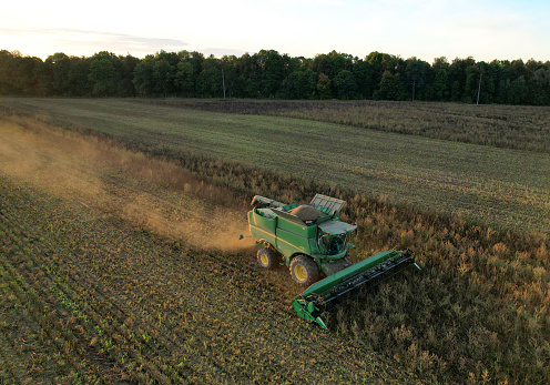 John Deere combine harvester on spring wheat harvesting. Wheat and corn markets react in crisis worlds breadbasket. Winter barley yields. Wheat, maize, soybeans. Russia, Smolensk, Sept 23, 2021.