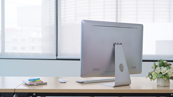 Laptop on designer workplace with blank screen. Creative designer desktop. Mock up, 3D Rendering