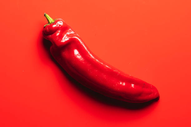 istock fresh red pepper on color background 1393772136