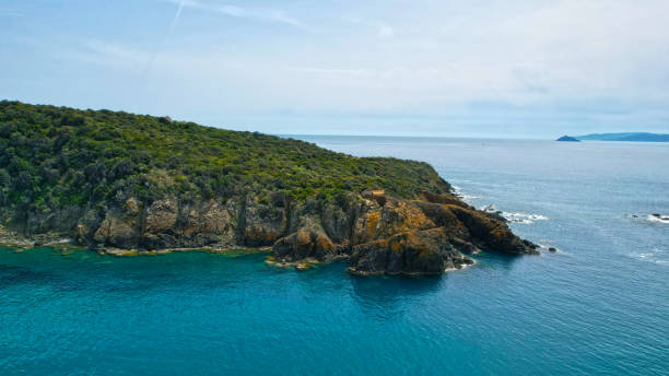 istock Seaside Cliff with Old Ruin with Graffiti 1393772561