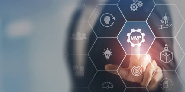 istock MVP, minimum viable product concept for lean startup. Life cycle of product development. Analysis and market validation.Touching on abbreviation MVP surrounded by learn, build, measure icons. 1393772769