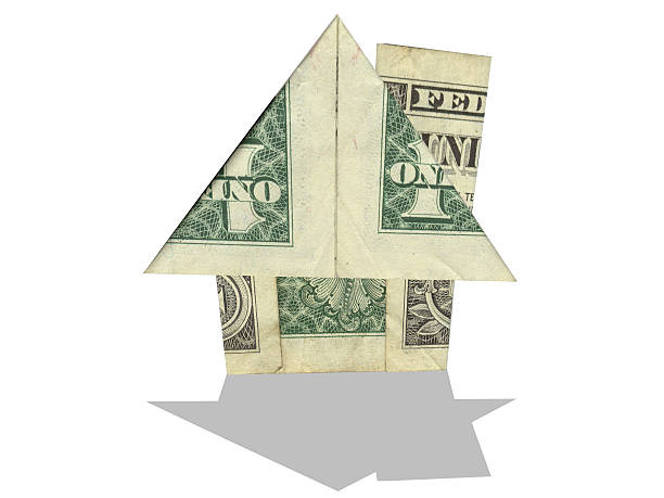 dollar bill house-divertimento ad angolo retto - foto stock