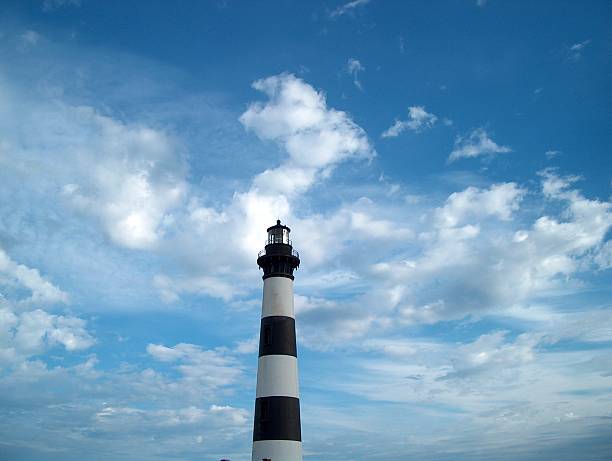 Sunny Days at the Lighthouse Bodie Island Lighthouse in the Outer Banks of North Carolina.  Taken January 2nd, 2004 bodie island stock pictures, royalty-free photos & images
