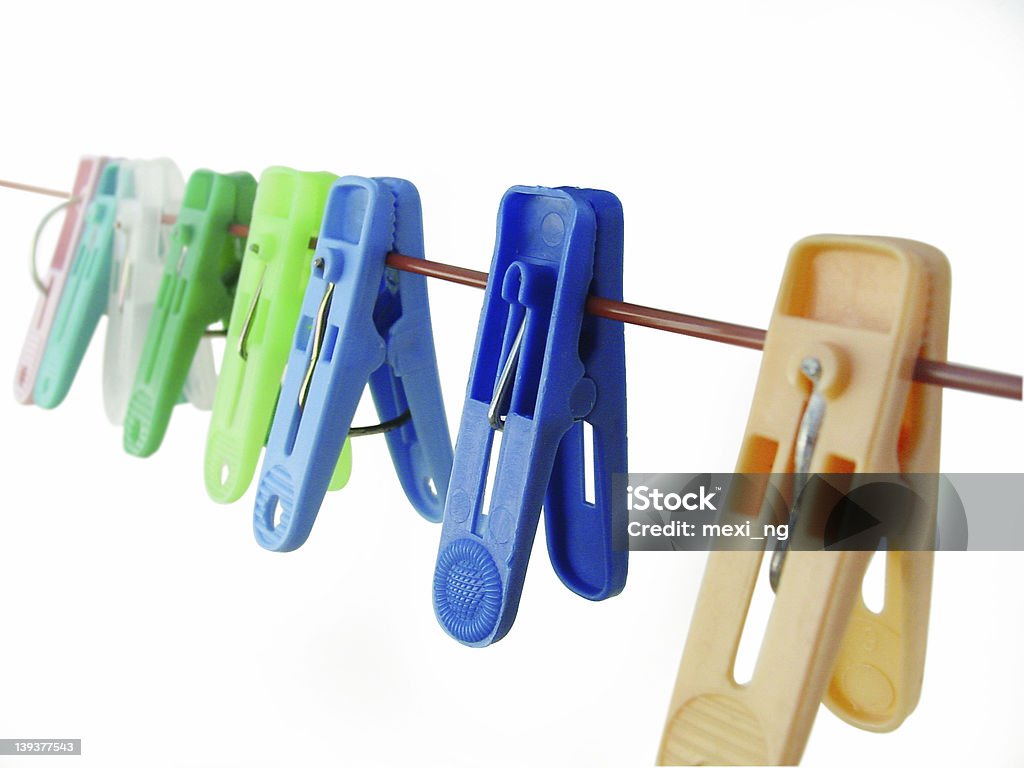 clothes pin different clothes pin on the hanger Blue Stock Photo