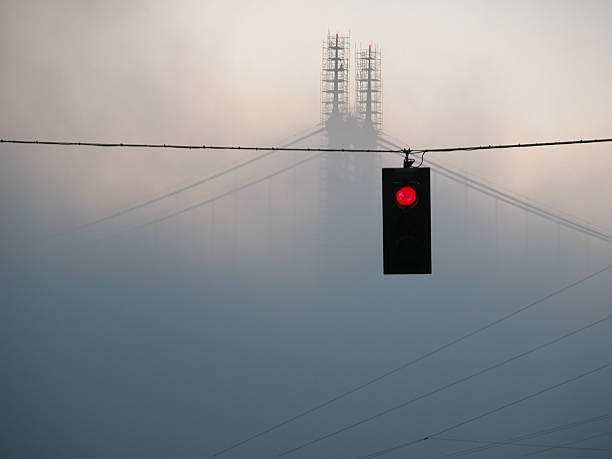 Bridge under construction in fog stock photo