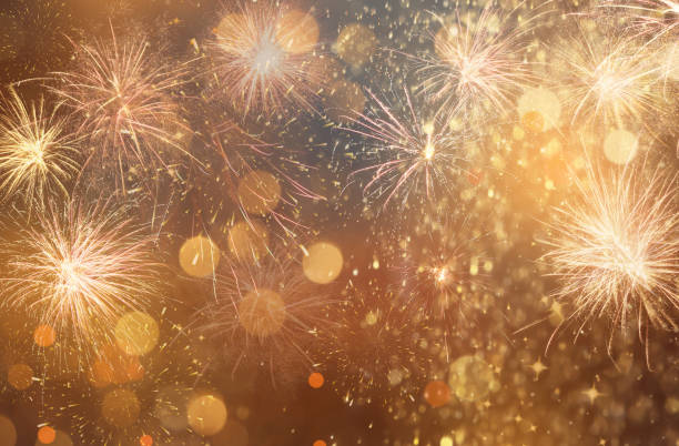 istock Abstract festive background with fireworks, bokeh effect. New Year celebration 1393776496